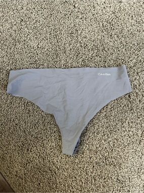 NWOT Calvin Klein grey logo thong
